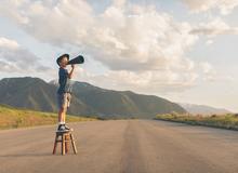 Child with megaphone making an announcement
